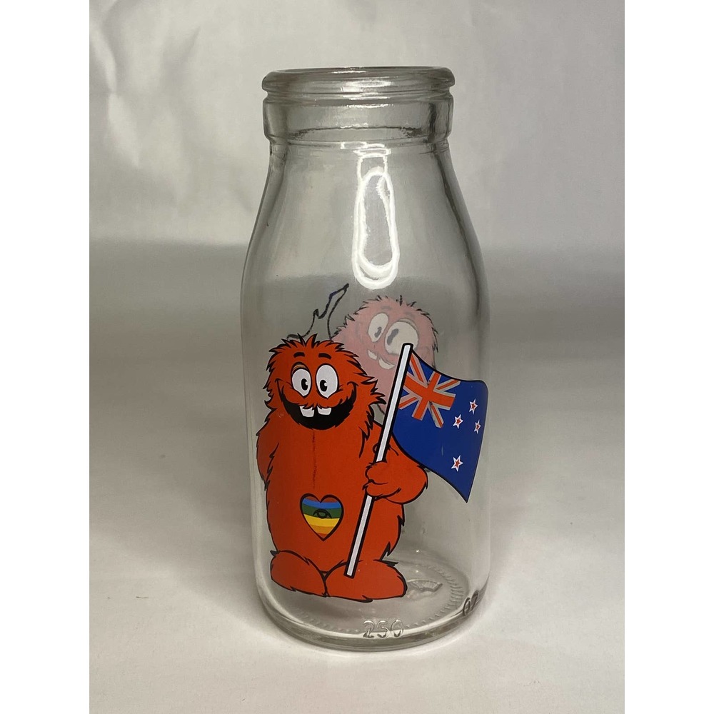 Vintage New Zealand Cookie Time Cookie Muncher Milk Jar Glass